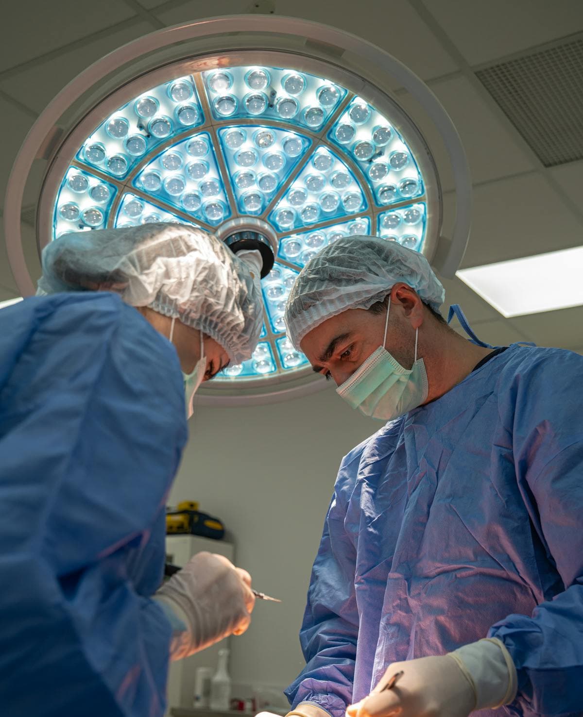 Neurosurgeon at the operating microscope, cinematic studio portrait