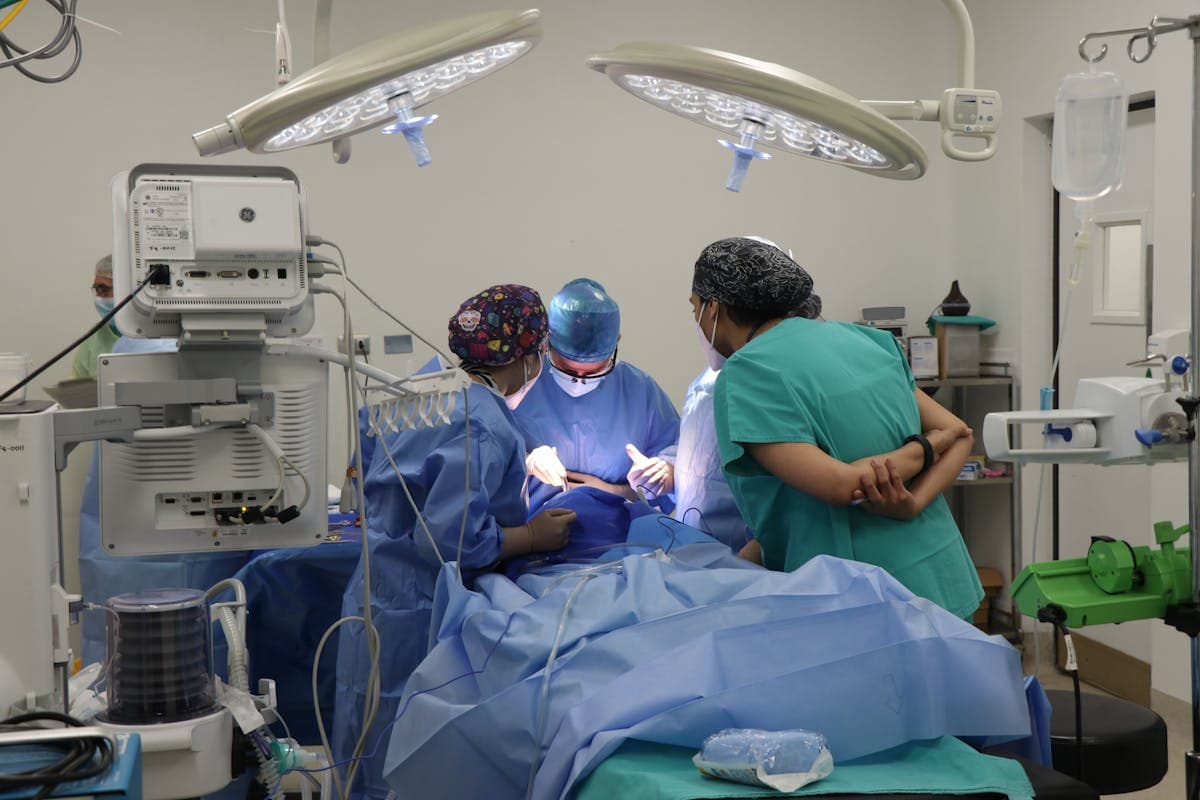 OB/GYN surgeon in the operating room, cinematic studio portrait